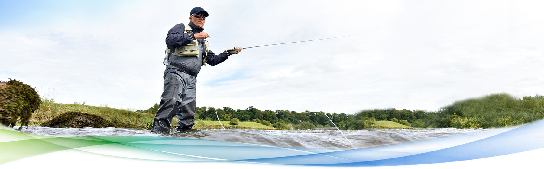 Man fly fishing in river.